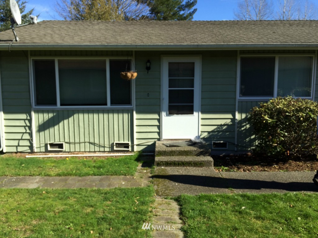 24306 Carter Road Bothell, WA 98021 - Photo 1 of 17 a front view of a house with a yard