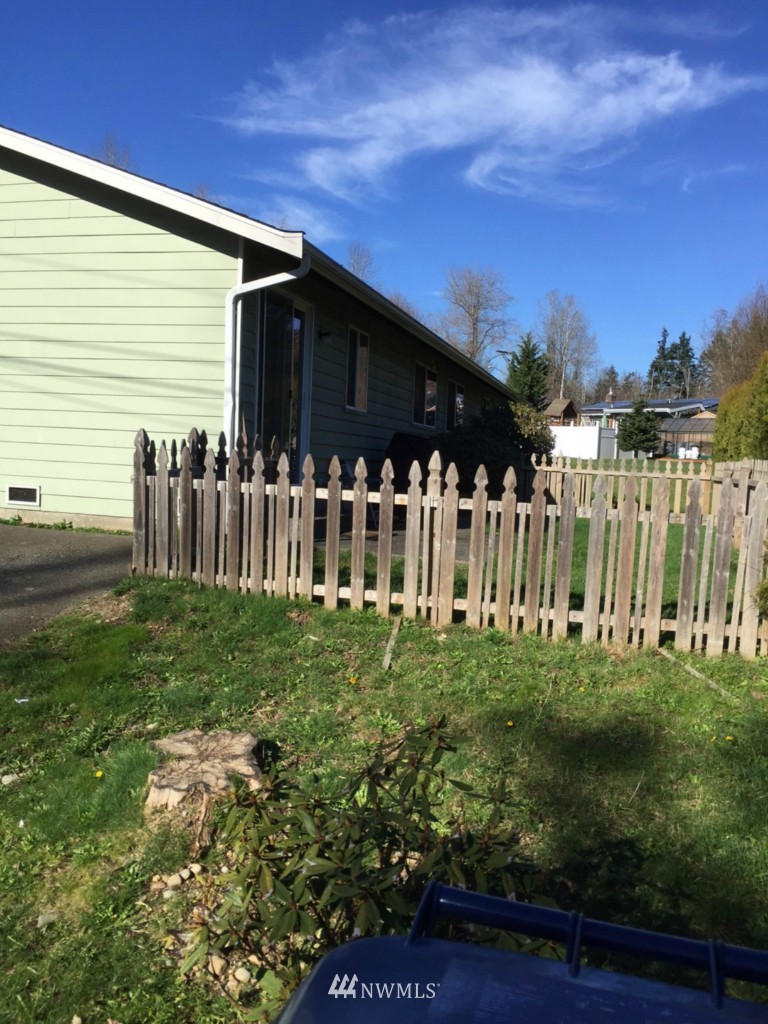 24306 Carter Road Bothell, WA 98021 - Photo 4 of 17 a view of a house with a yard