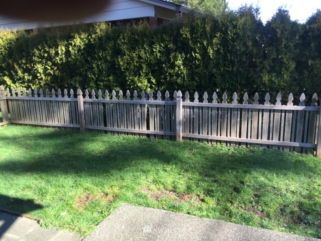 24306 Carter Road Bothell, WA 98021 - Photo 8 of 17 a view of a yard with a fence