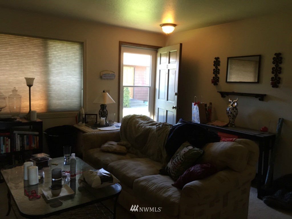24306 Carter Road Bothell, WA 98021 - Photo 10 of 17 a living room with furniture and a flat screen tv