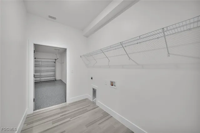 a view of an empty walk in closet