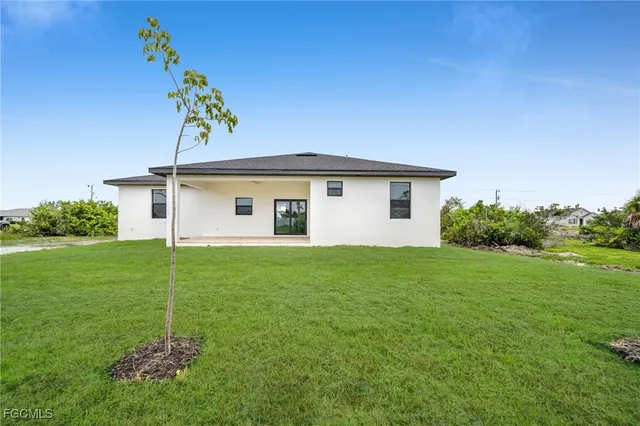a house view with a garden space