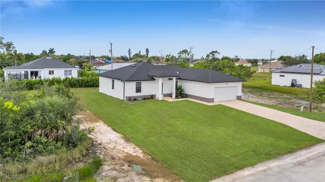 a aerial view of a house with garden