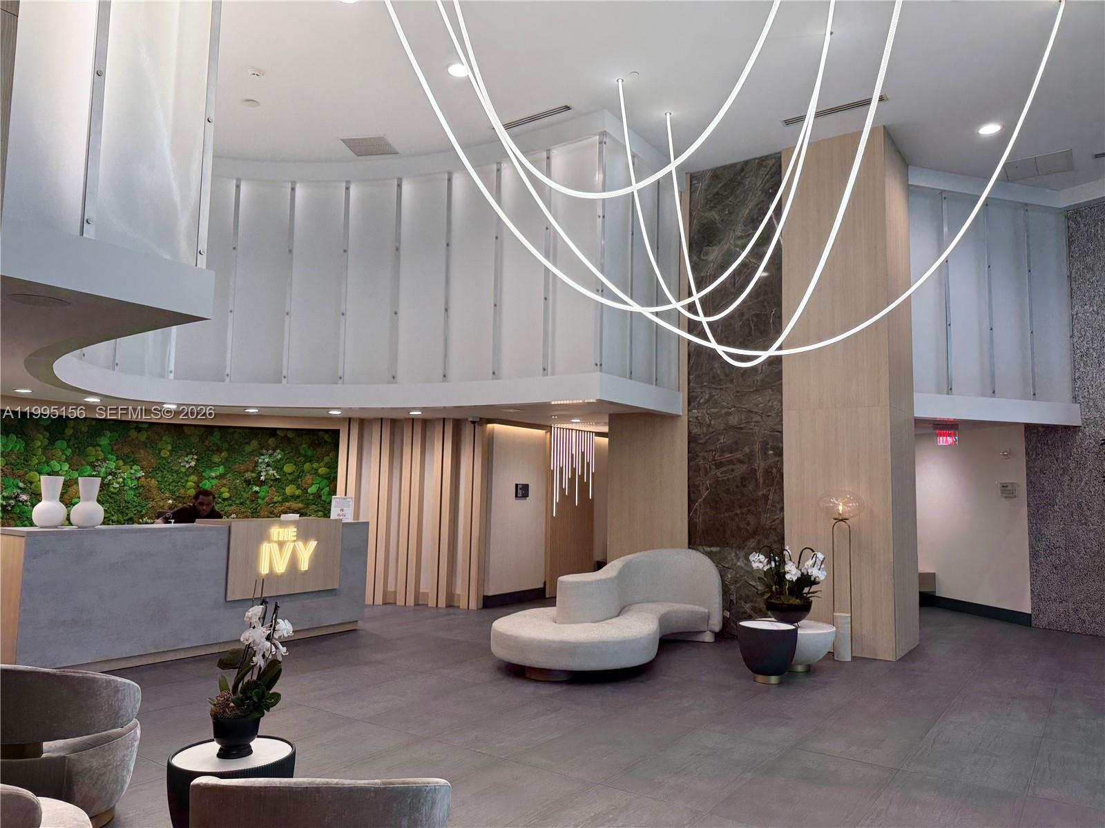 90 Southwest 3rd Street, Unit 2112 Miami, FL 33130 - Photo 20 of 40 a room with gym equipment