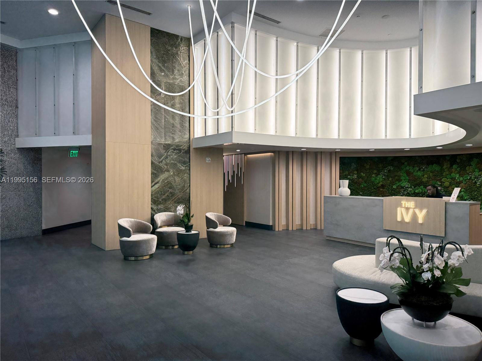 90 Southwest 3rd Street, Unit 2112 Miami, FL 33130 - Photo 21 of 40 a living room with furniture flowerpot and a window