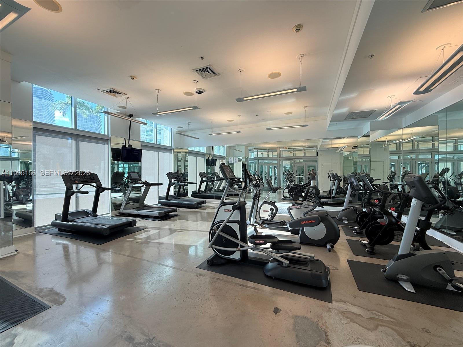 90 Southwest 3rd Street, Unit 2112 Miami, FL 33130 - Photo 32 of 40 a view of a room with gym equipment