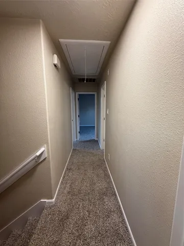 a bathroom with a double vanity sink mirror and toilet