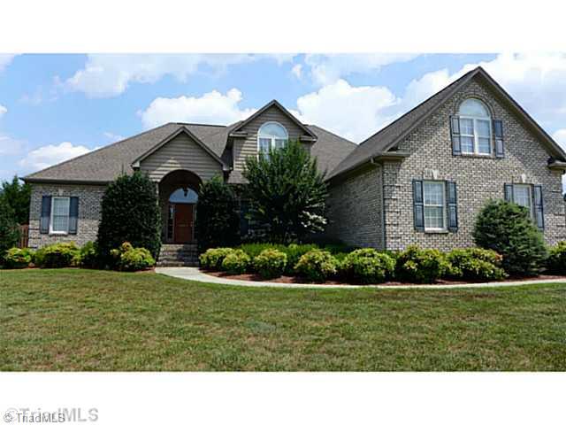 5907 Beckenham Way Oak Ridge, NC 27310 - Photo 1 of 16 Exterior Front.