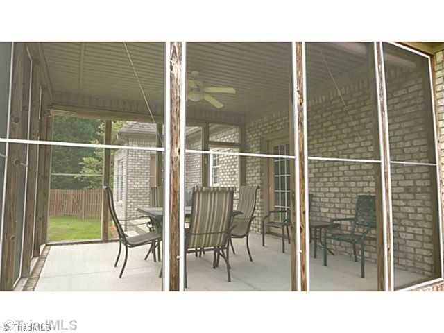 5907 Beckenham Way Oak Ridge, NC 27310 - Photo 15 of 16 Screened Porch.