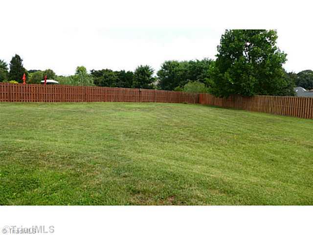 5907 Beckenham Way Oak Ridge, NC 27310 - Photo 16 of 16 Exterior Back.