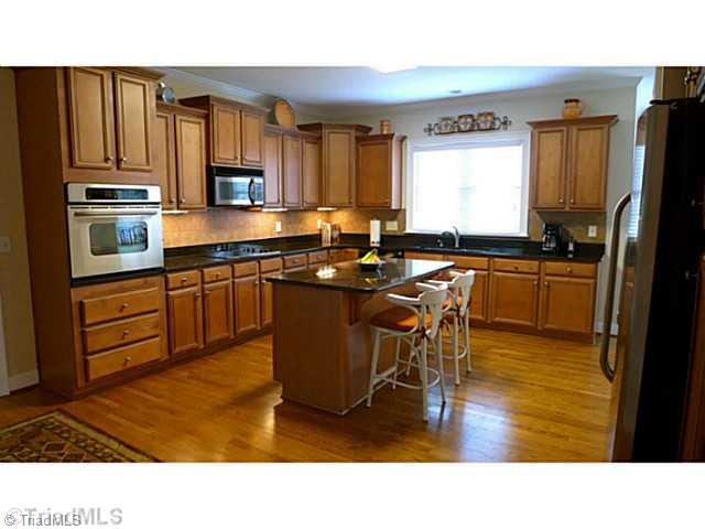 5907 Beckenham Way Oak Ridge, NC 27310 - Photo 5 of 16 Kitchen.