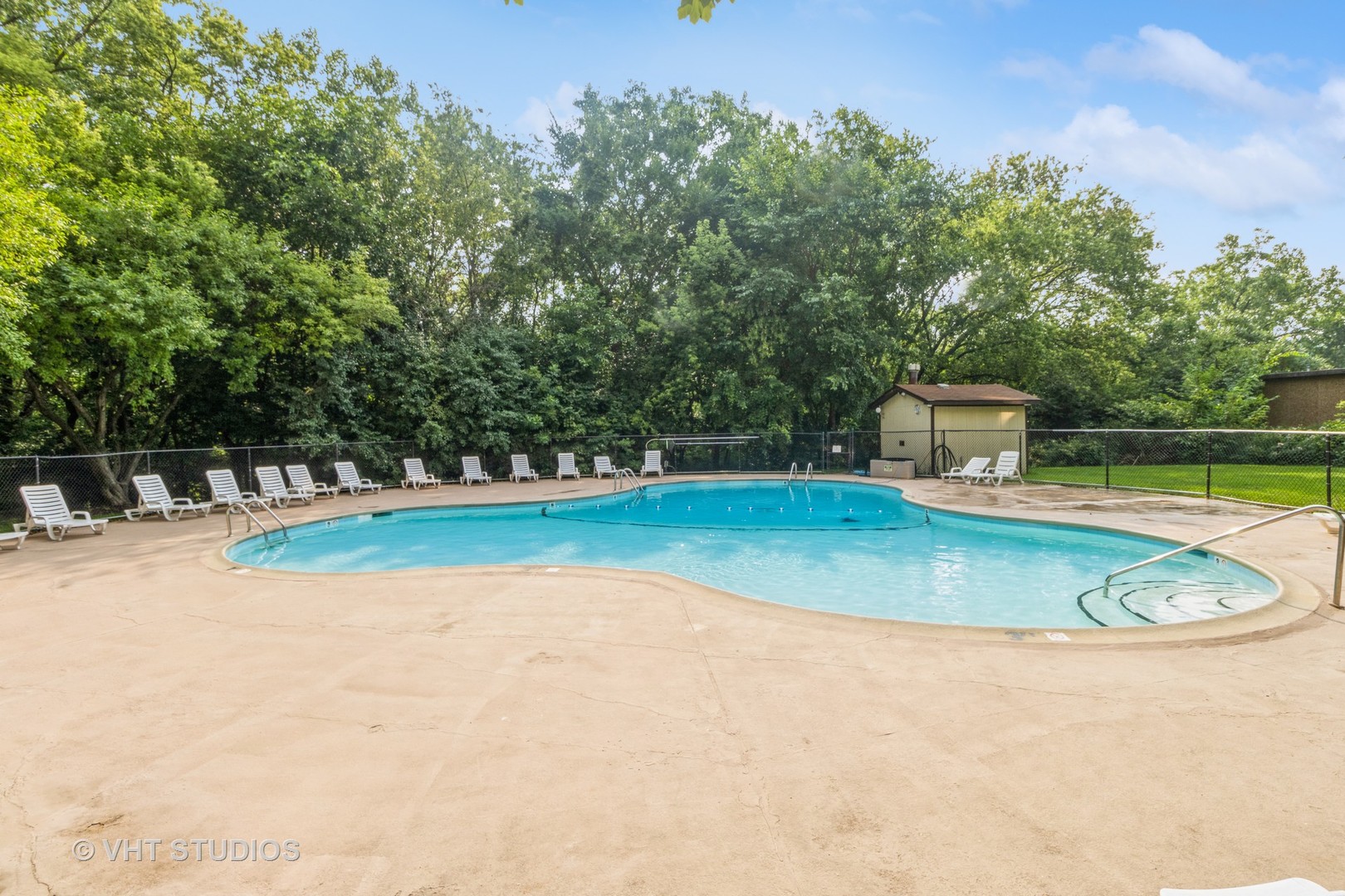 1 Renaissance Place, Unit 217 Palatine, IL 60067 - Photo 11 of 17 a view of a swimming pool with a yard