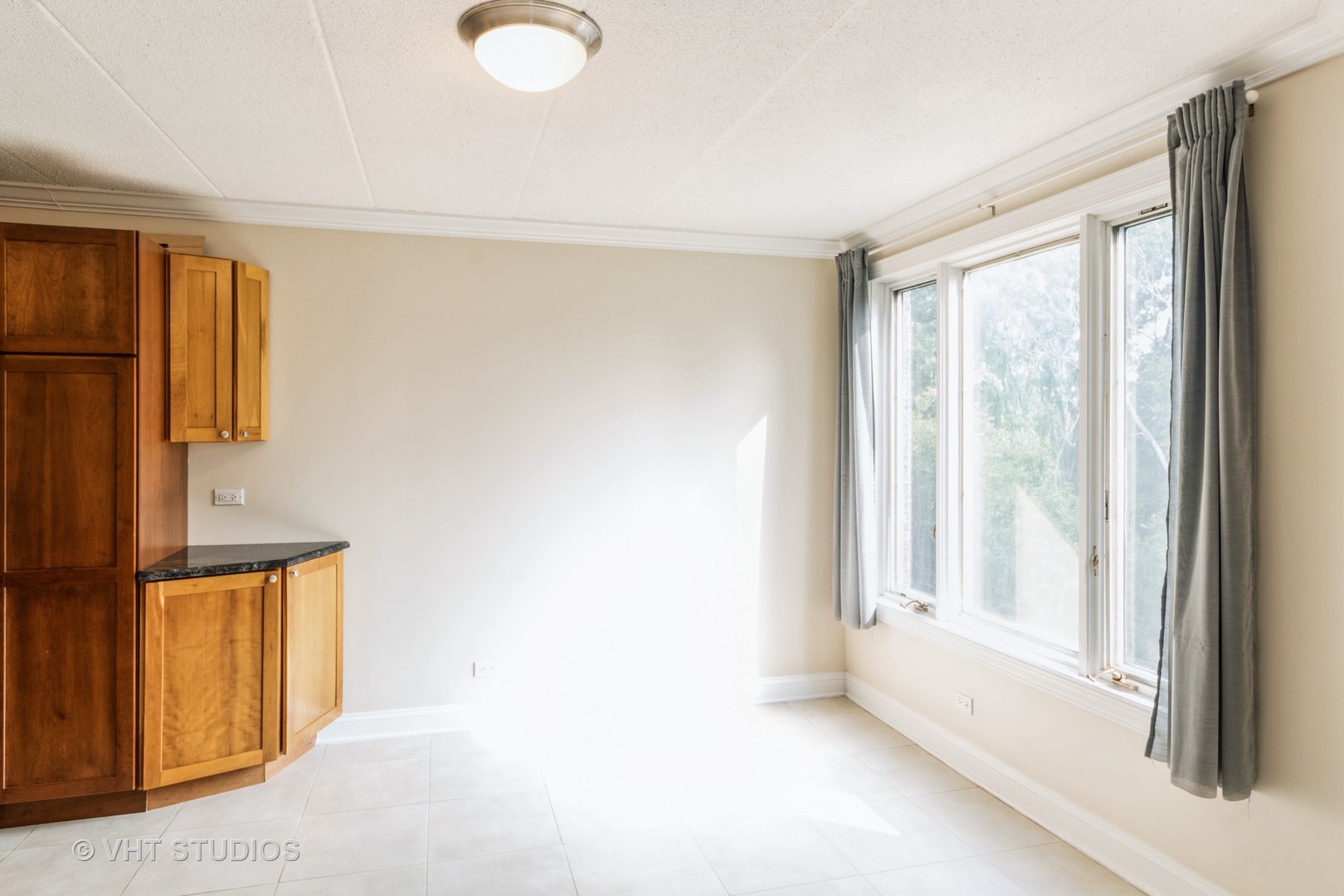 1 Renaissance Place, Unit 217 Palatine, IL 60067 - Photo 16 of 17 a view of an empty room with a window