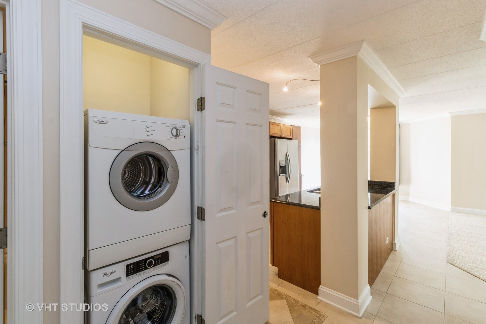 1 Renaissance Place, Unit 217 Palatine, IL 60067 - Photo 7 of 17 a view of a hallway with washer and dryer