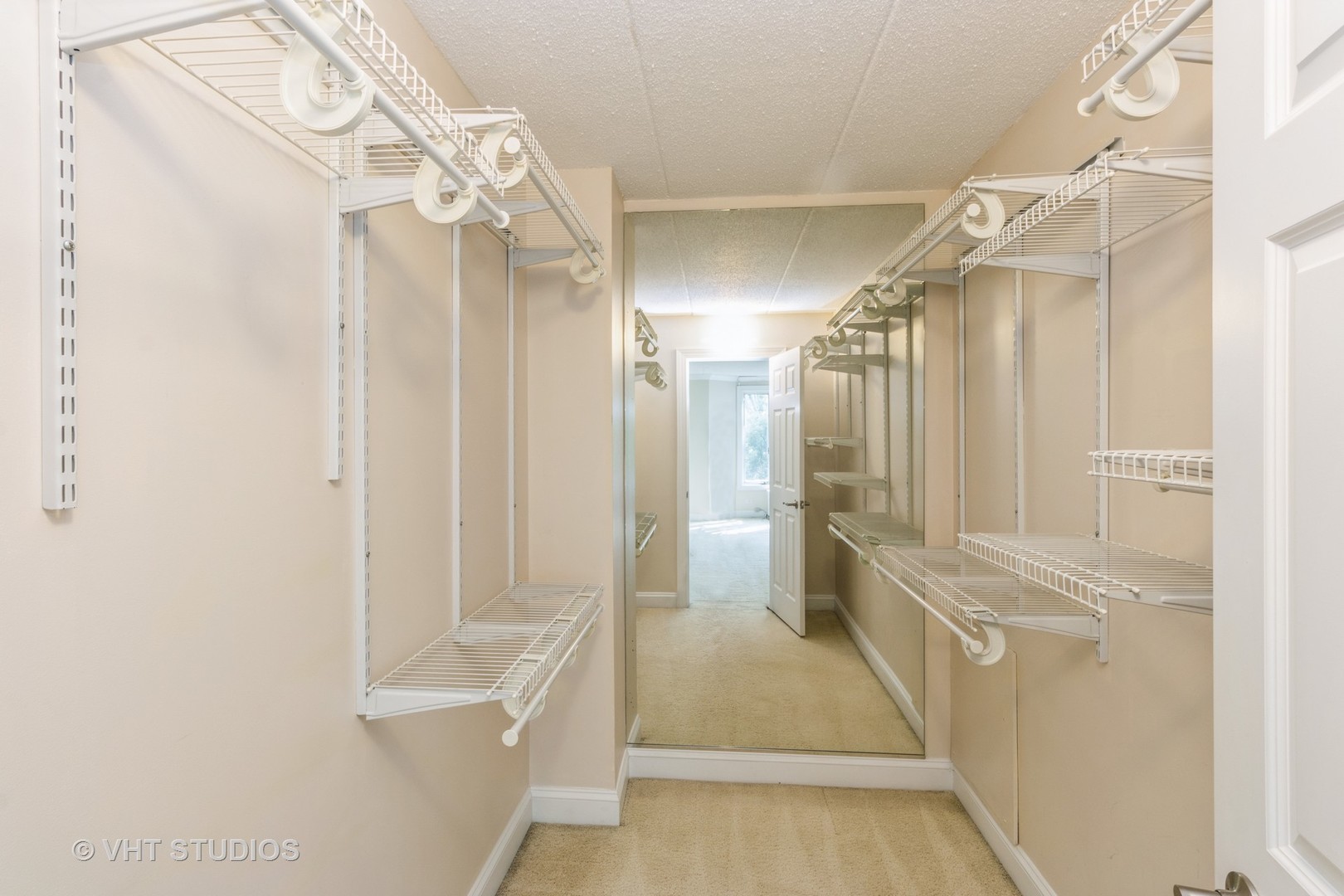 1 Renaissance Place, Unit 217 Palatine, IL 60067 - Photo 9 of 17 a bathroom with a sink a toilet and shower