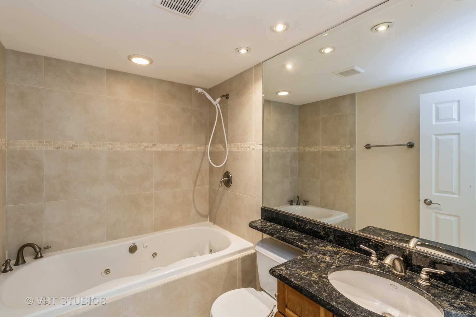 1 Renaissance Place, Unit 217 Palatine, IL 60067 - Photo 10 of 17 a bathroom with a granite countertop sink mirror toilet and bathtub