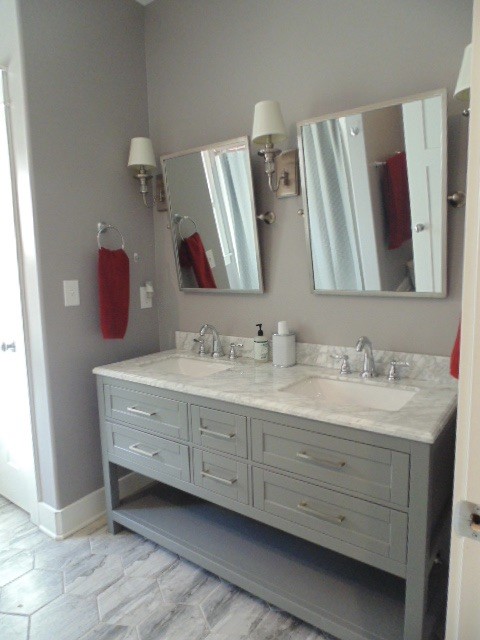 1024 Deepwoods Road Sewanee, TN 37375 - Photo 24 of 38 a bathroom with a double vanity sink and mirror