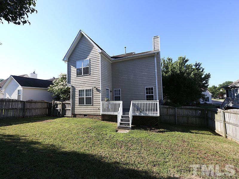 4405 Moss Spring Drive Raleigh, NC 27616 - Photo 12 of 12 a view of a house with a yard
