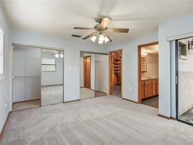 a bathroom with a sink a toilet and a shower
