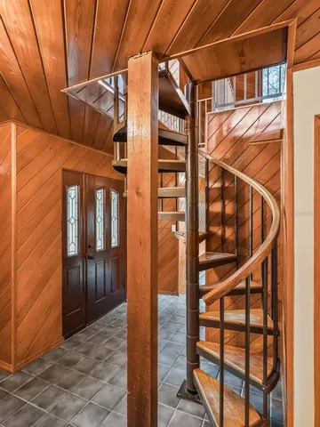 a view of a hallway with a window