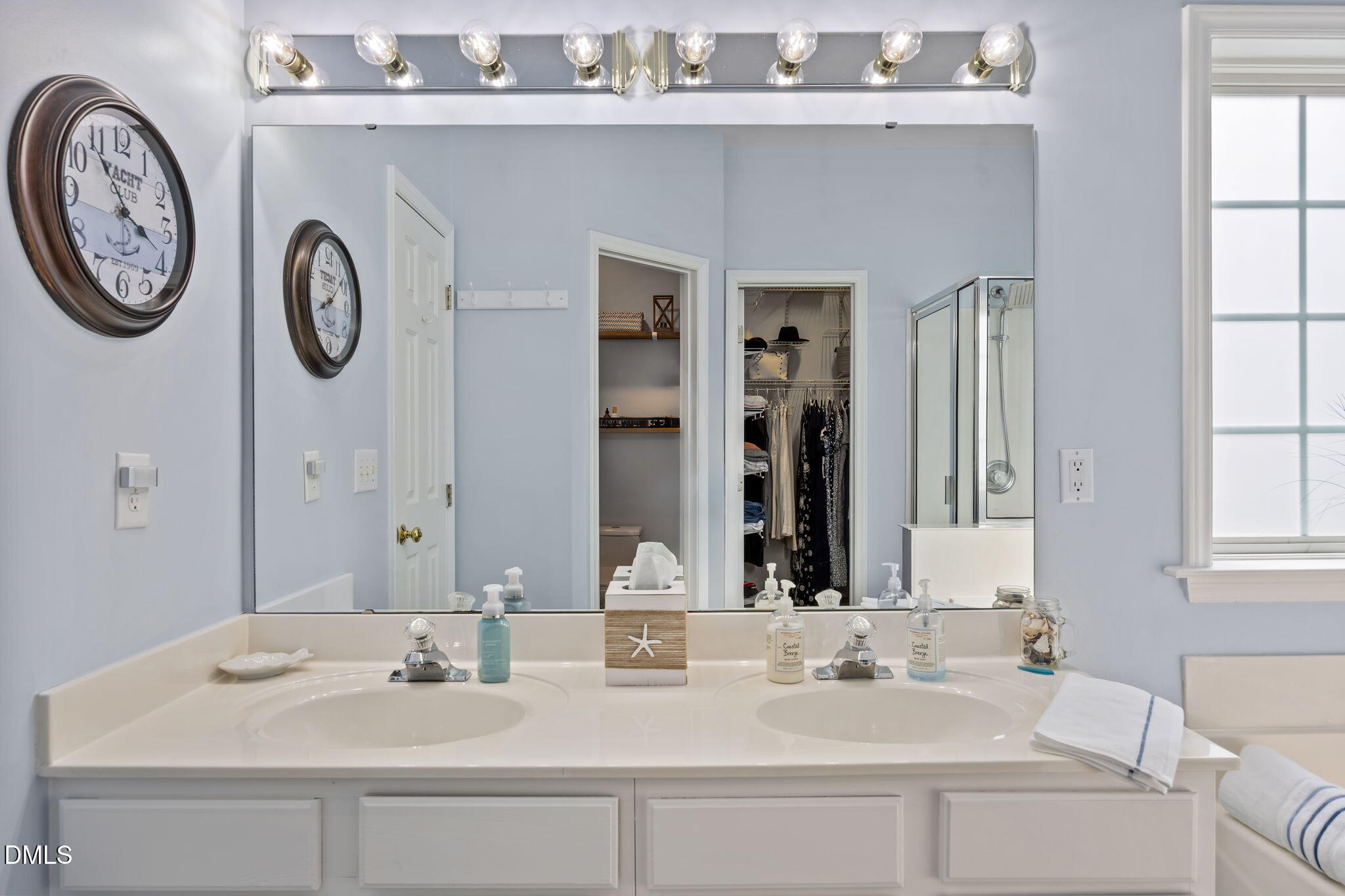 7 Bethany Place Durham, NC 27712 - Photo 18 of 33 a bathroom with a sink and a mirror