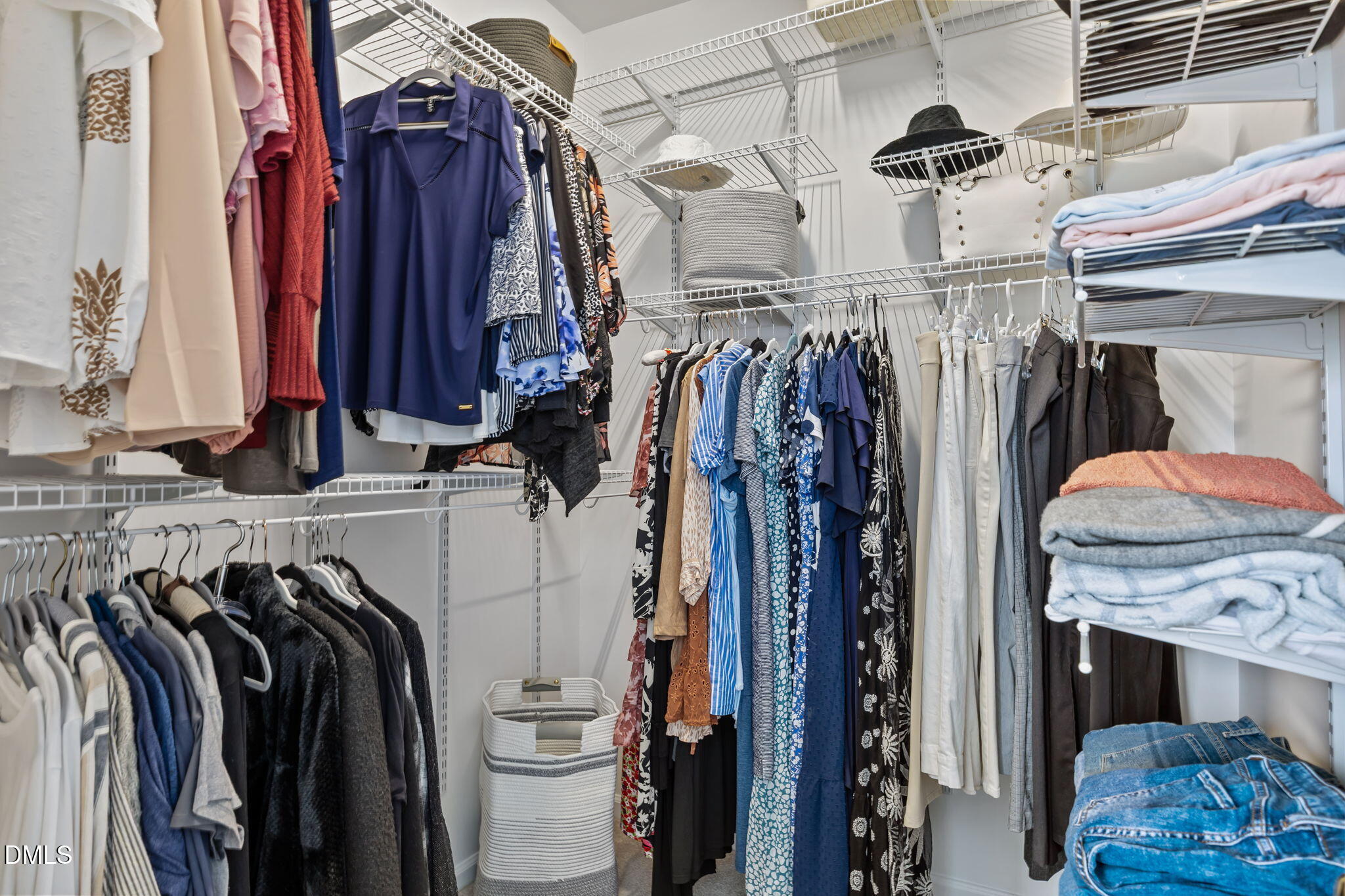 7 Bethany Place Durham, NC 27712 - Photo 20 of 33 a view of walk in closet with clothes
