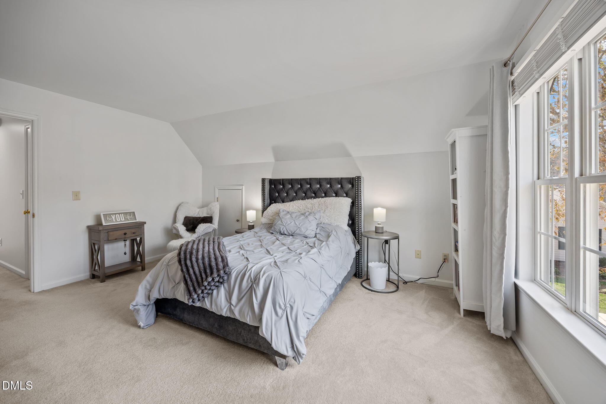 7 Bethany Place Durham, NC 27712 - Photo 26 of 33 a spacious bedroom with a bed and a large window