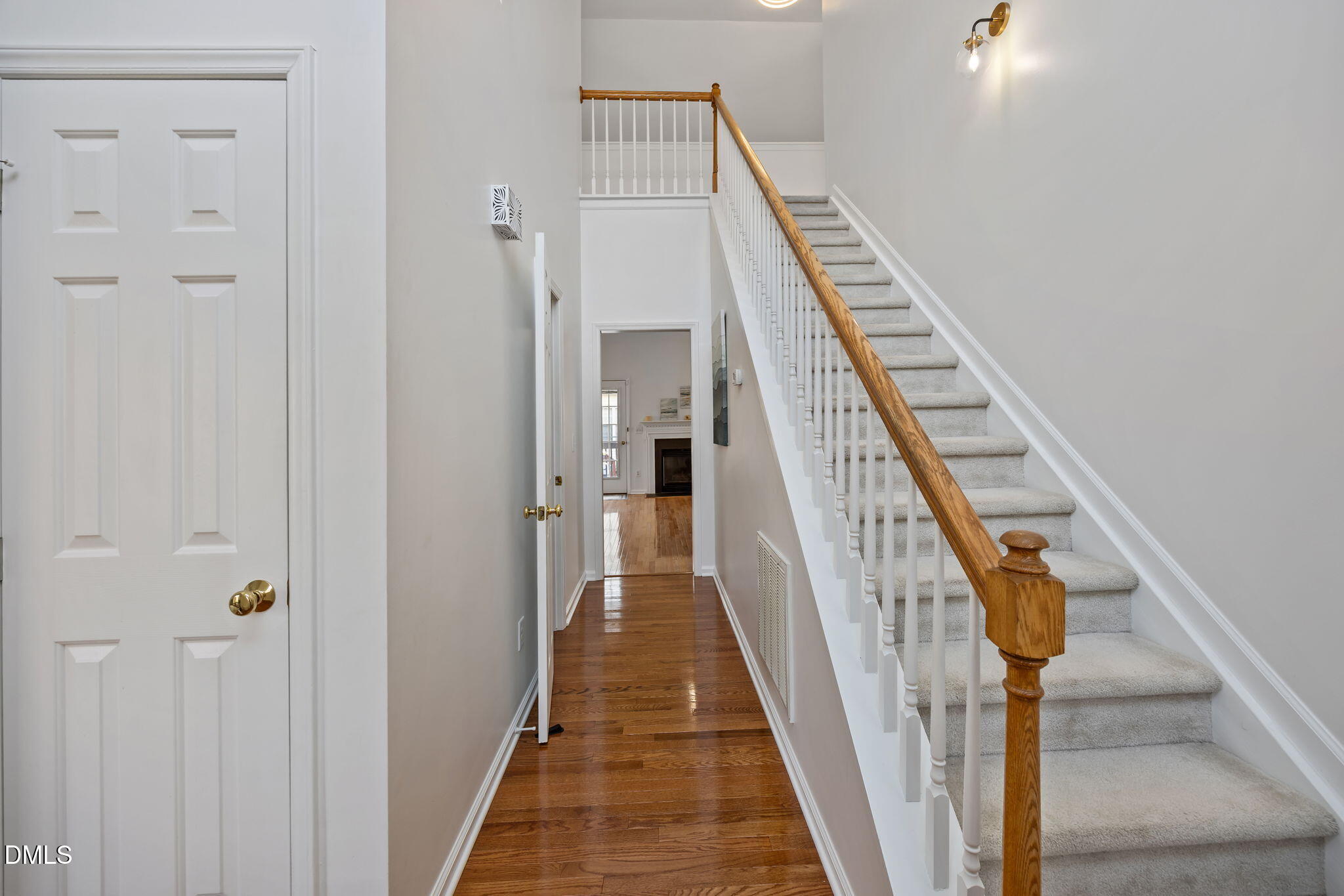 7 Bethany Place Durham, NC 27712 - Photo 3 of 33 a view of a hallway with wooden floor and entryway