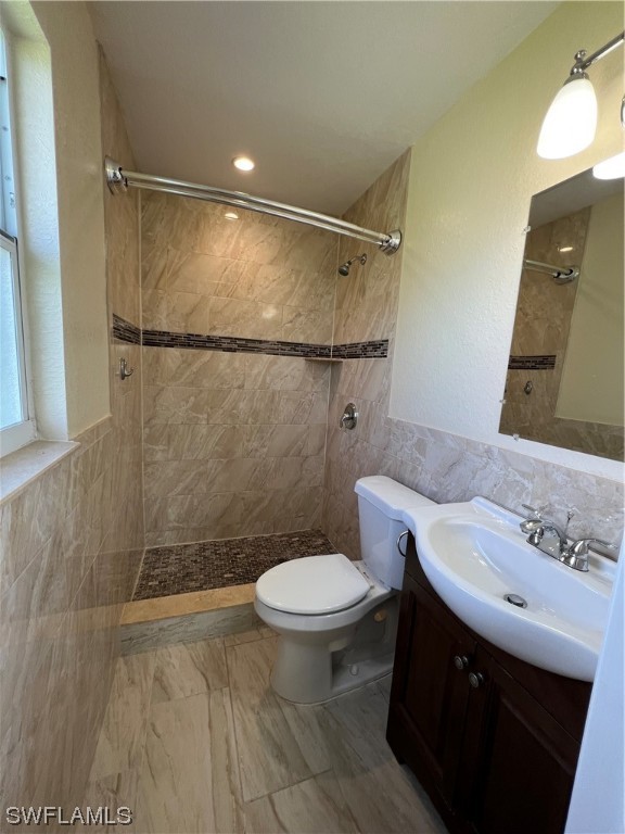 513 Wyoming Road Lehigh Acres, FL 33936 - Photo 19 of 30 a bathroom with a sink and a mirror