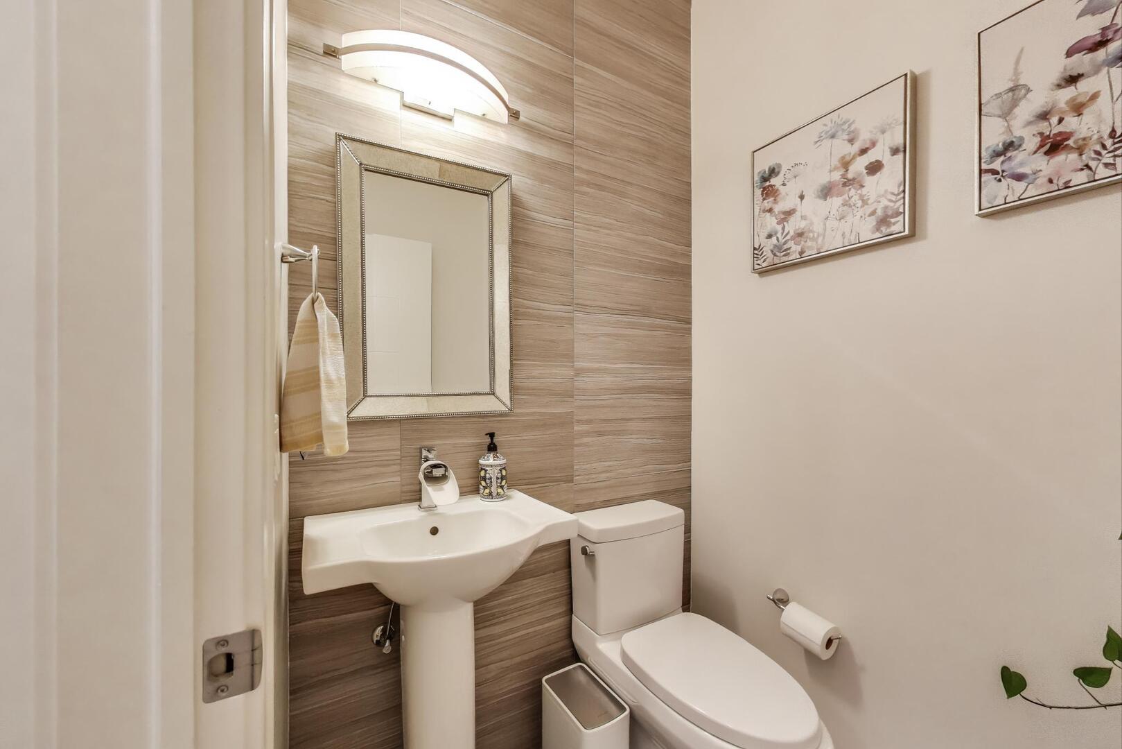 1832 West Rice Street, Unit 1N Chicago, IL 60622 - Photo 11 of 28 a bathroom with a toilet sink and mirror
