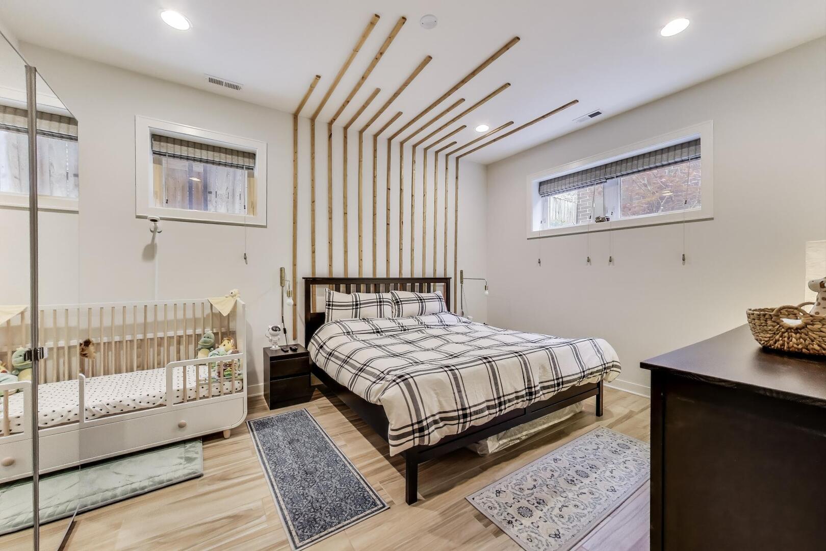 1832 West Rice Street, Unit 1N Chicago, IL 60622 - Photo 12 of 28 a bedroom with a bed and wooden floor