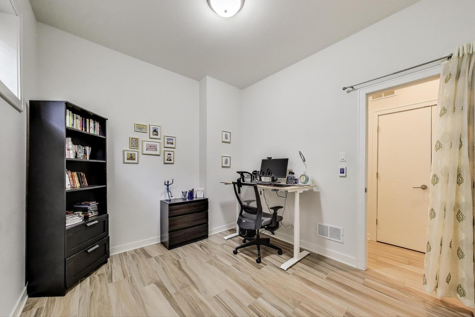 1832 West Rice Street, Unit 1N Chicago, IL 60622 - Photo 20 of 28 a view of a workspace with furniture and a window