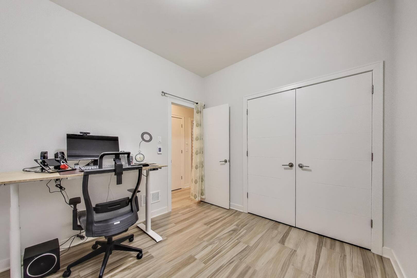 1832 West Rice Street, Unit 1N Chicago, IL 60622 - Photo 21 of 28 a view of a workspace with furniture and wooden floor