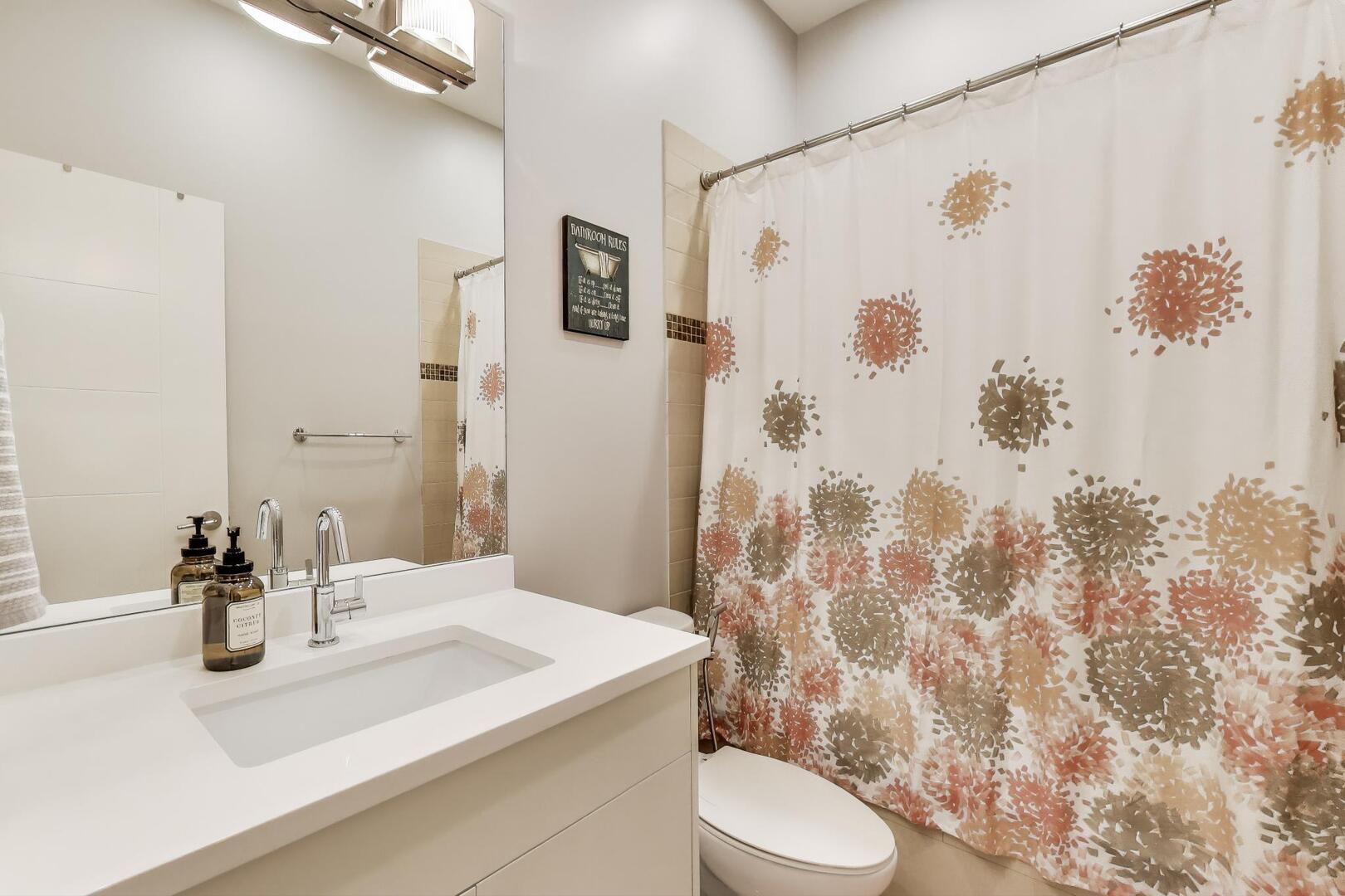 1832 West Rice Street, Unit 1N Chicago, IL 60622 - Photo 22 of 28 a bathroom with a sink toilet and shower