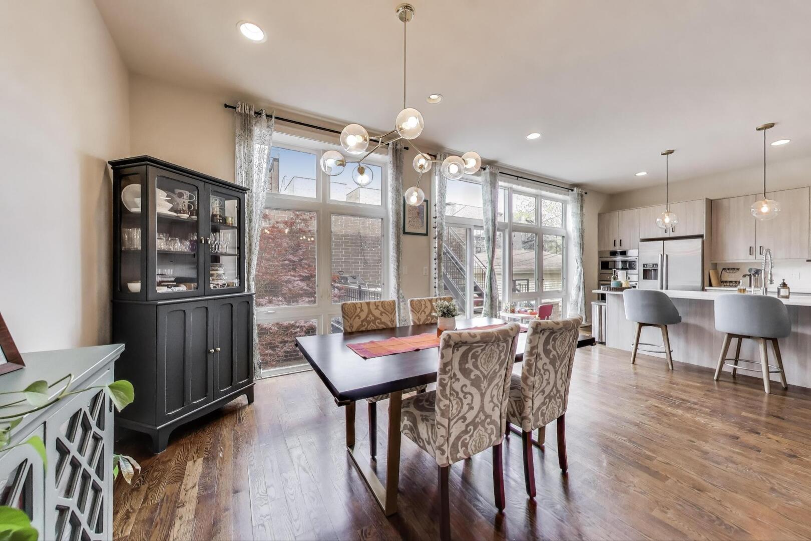 1832 West Rice Street, Unit 1N Chicago, IL 60622 - Photo 8 of 28 a view of a dining room with furniture window and wooden floor