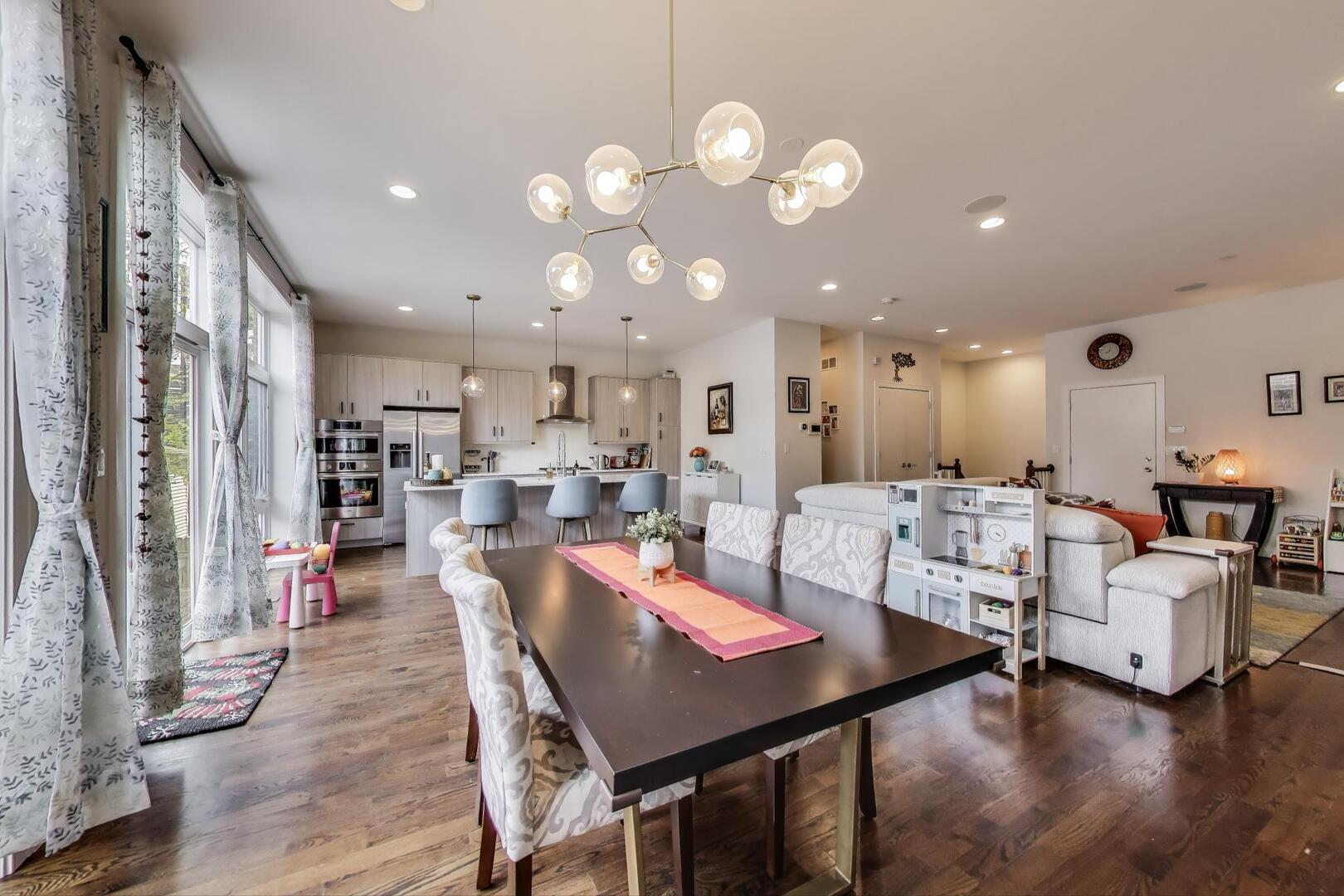 1832 West Rice Street, Unit 1N Chicago, IL 60622 - Photo 9 of 28 a view of a dining room with furniture and wooden floor