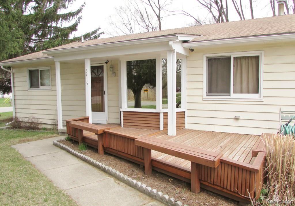 3415 West Utica Road Utica, MI 48317 - Photo 3 of 31 LOVELY DECK WITH SEATING ON FRONT OF HOME AS WELL AS REAR