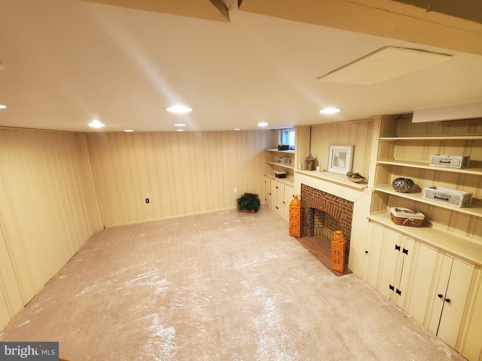 119 Overbrook Road Baltimore, MD 21212 - Photo 21 of 24 FAMILY ROOM WITH NEW CARPET, RECESSED LIGHTING