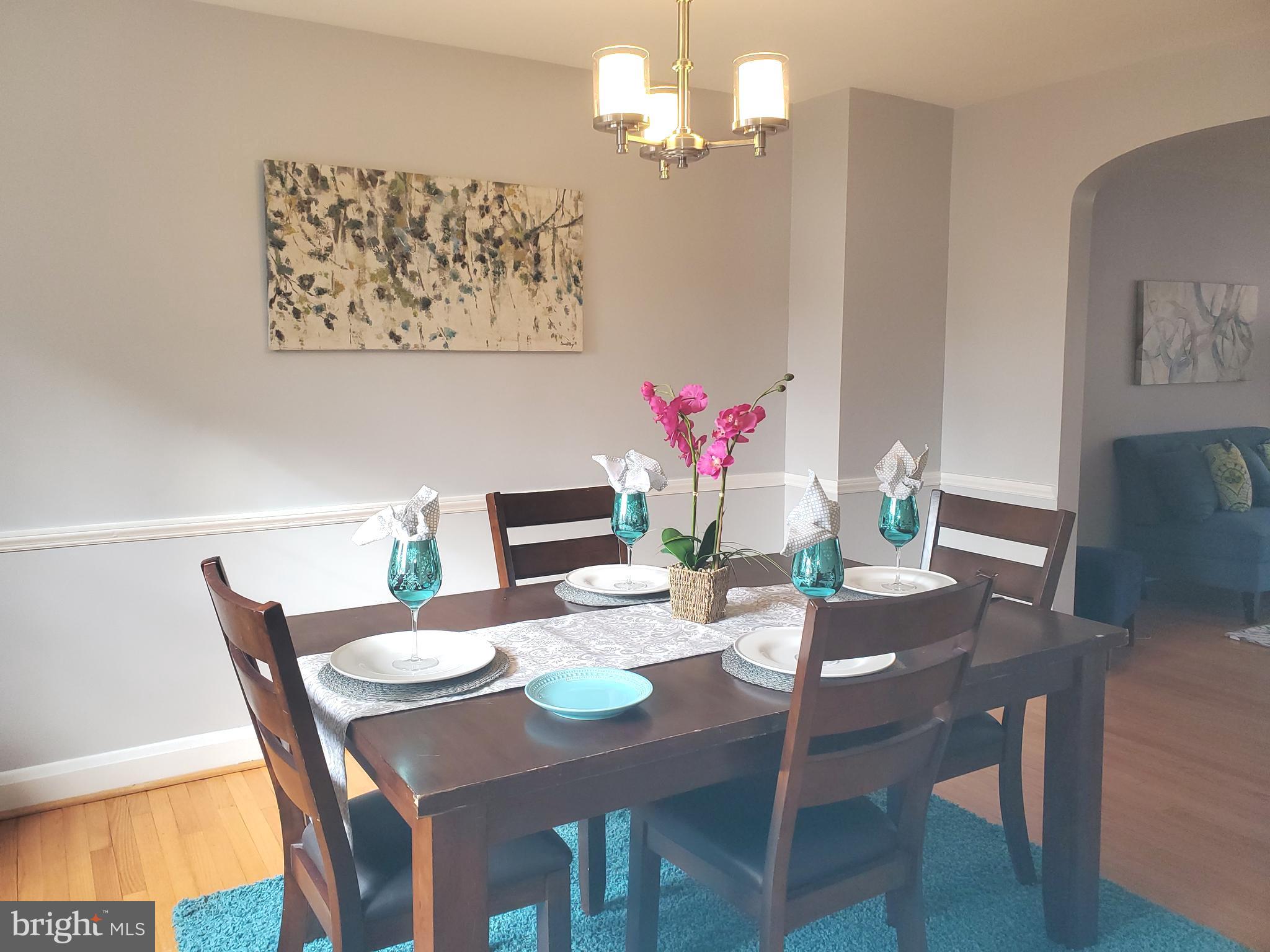 119 Overbrook Road Baltimore, MD 21212 - Photo 7 of 24 DINING ROOM WITH NEW LIGHT FIXTURE