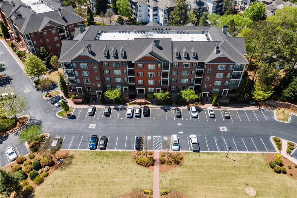 2300 Peachford Road, Unit 4203 Dunwoody, GA 30338 - Photo 1 of 1 a aerial view of a house with a swimming pool
