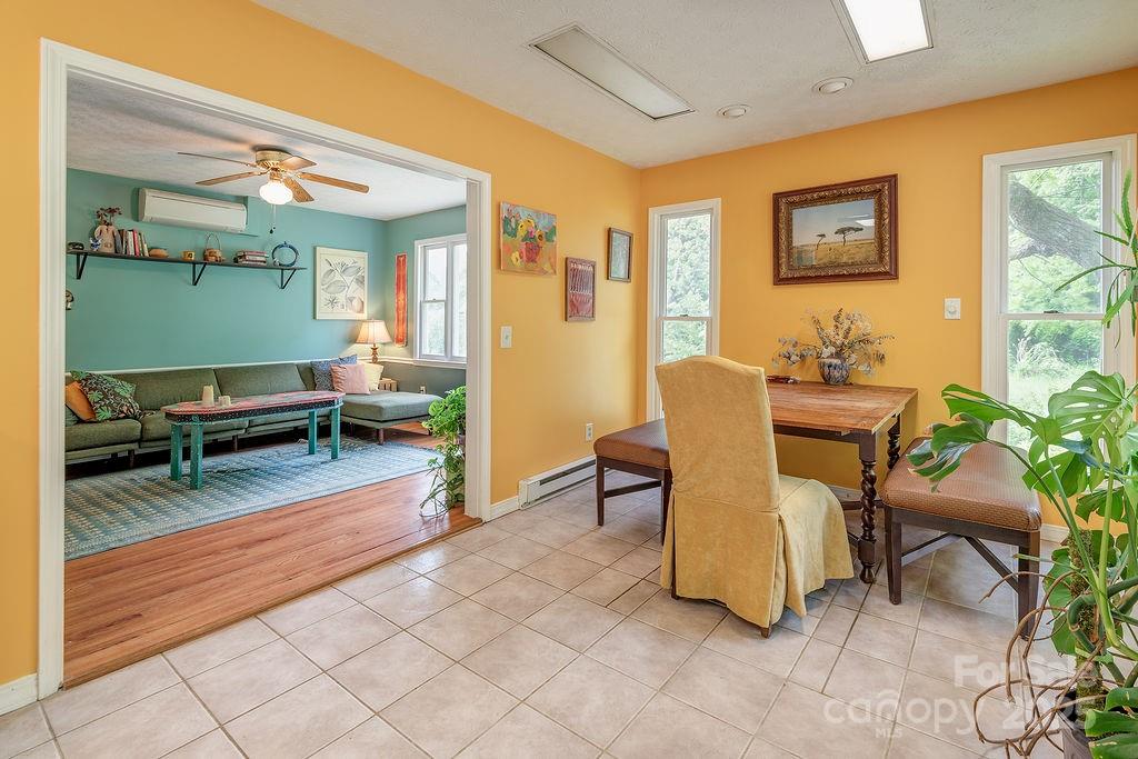 124 Beaverdam Loop Road Candler, NC 28715 - Photo 5 of 31 a living room with furniture and a table