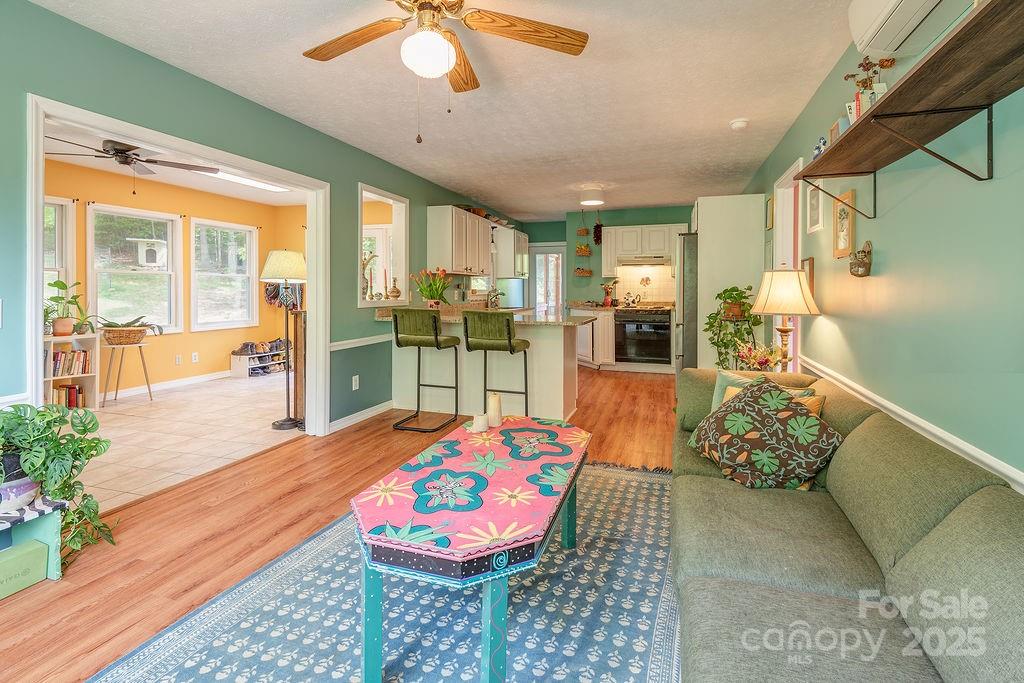 124 Beaverdam Loop Road Candler, NC 28715 - Photo 8 of 31 a outdoor space with furniture