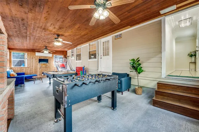 a view of a chairs and table in a room