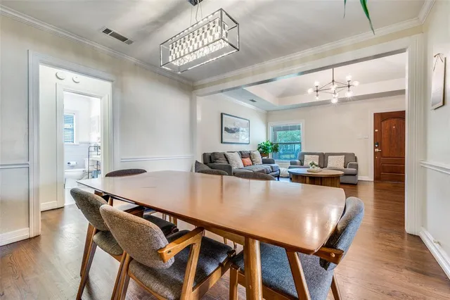 a kitchen with a table and chairs in it