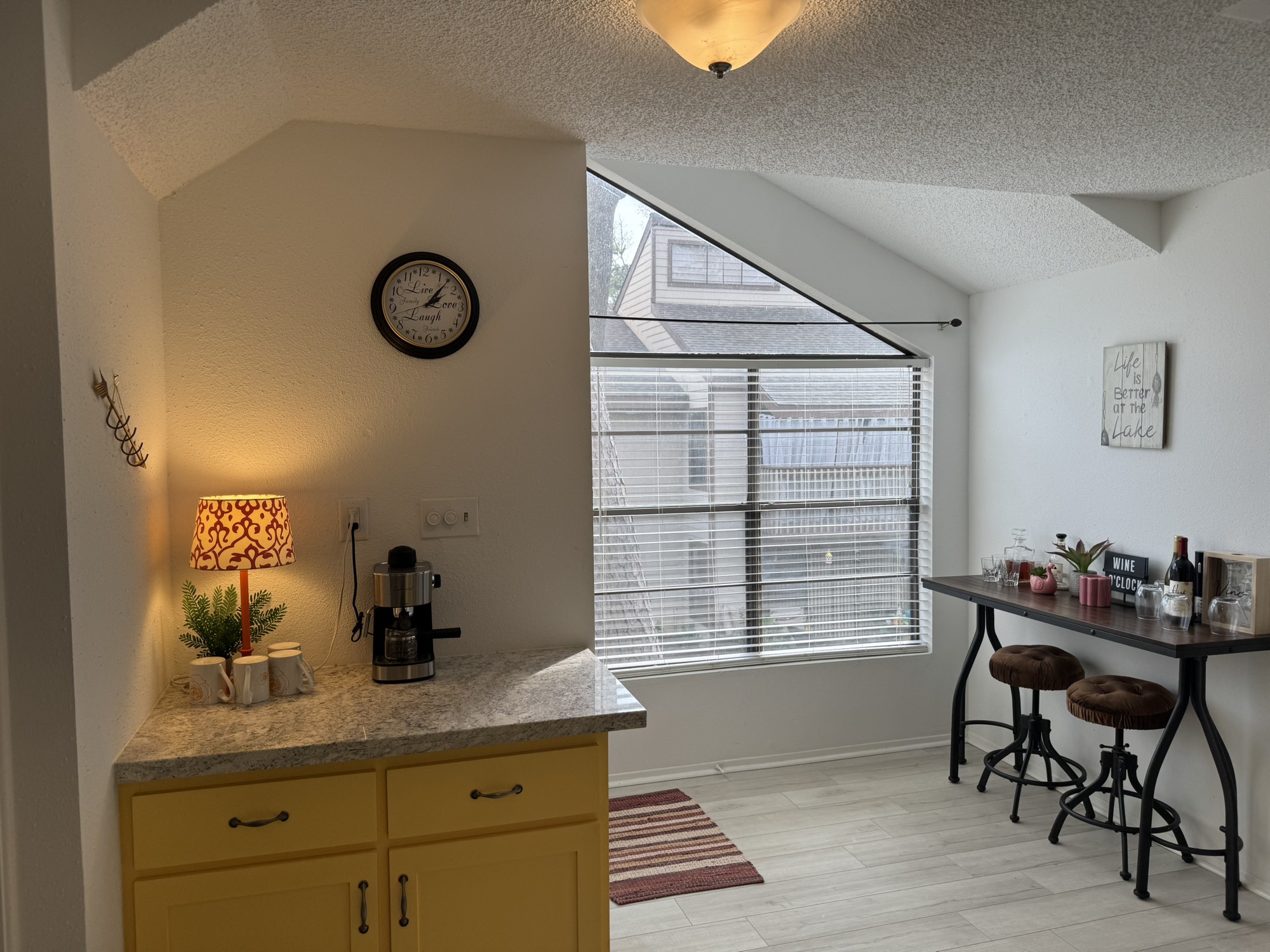 12900 Walden Road, Unit 820 Montgomery, TX 77356 - Photo 3 of 14 a room with a table and chair