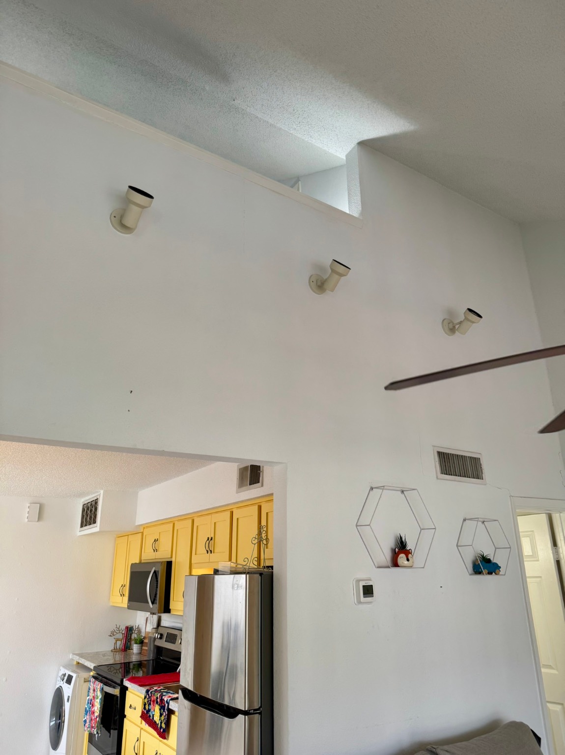 12900 Walden Road, Unit 820 Montgomery, TX 77356 - Photo 8 of 14 a view of kitchen with a refrigerator
