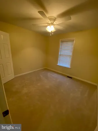 a view of a livingroom with wooden floor