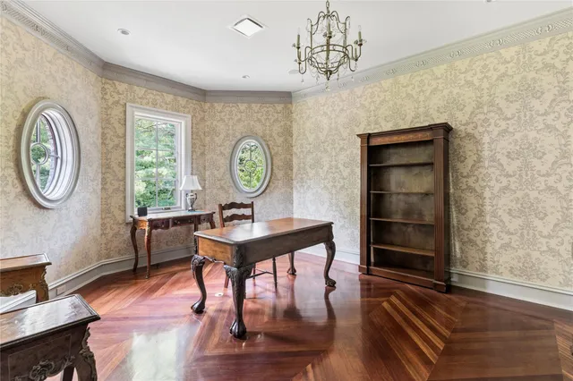 a view of a room with furniture window and wooden floor