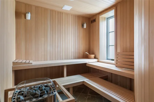 a kitchen with a stove and a window