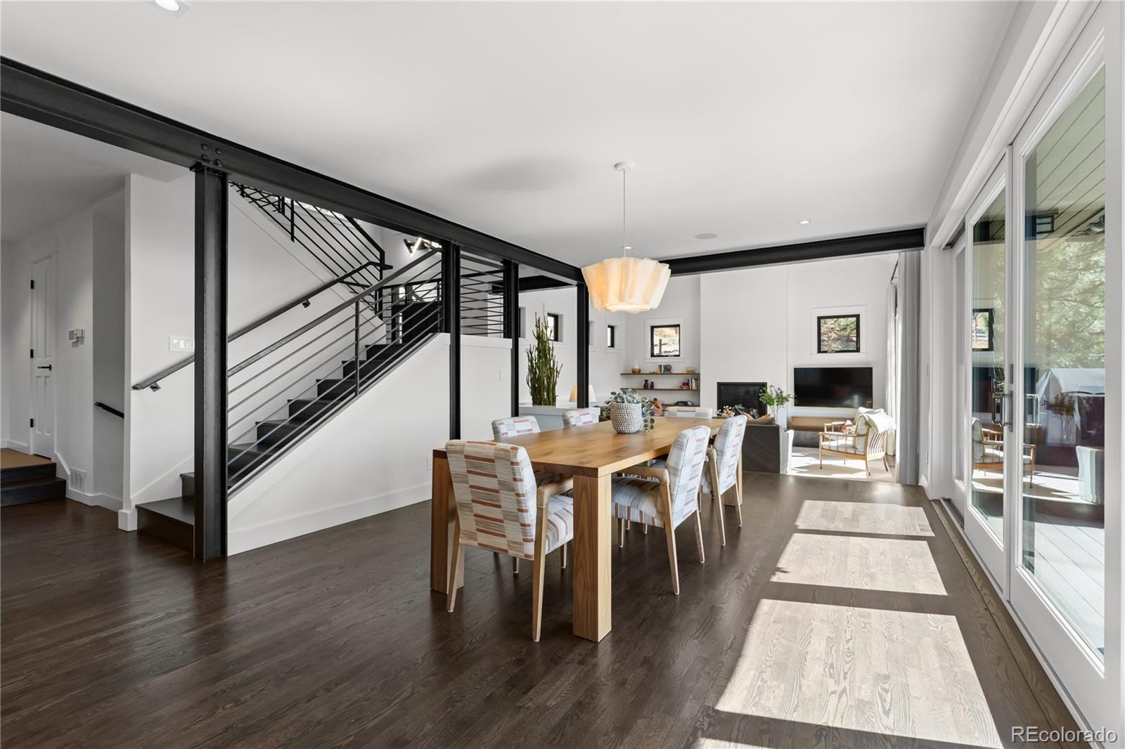 14 Pine Brook Road Boulder, CO 80304 - Photo 11 of 49 a view of a dining room with furniture window and wooden floor